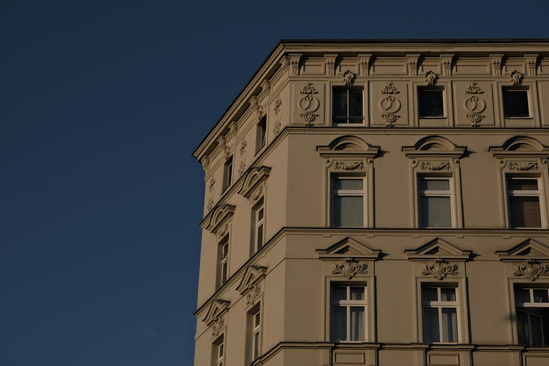 A tall building with a clock on the side of it